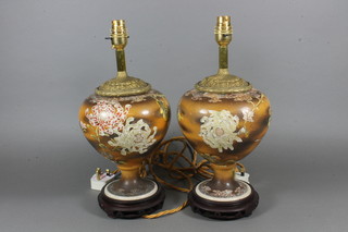A pair of Japanese Satsuma vases converted to electric table  lamps with gilt mounts 11"