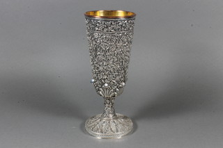 A Victorian embossed silver goblet/chalice, raised on a spreading foot by Elkingtons 9"