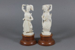 2 carved ivory figures of standing dancers 5"