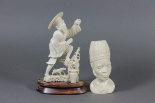 A carved ivory portrait bust 4" and a carved ivory figure of a fisherman 5"