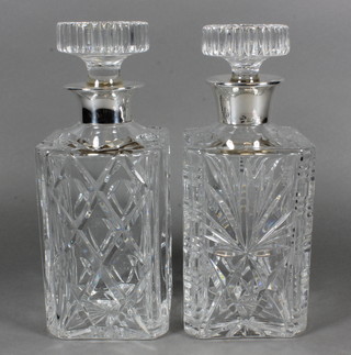 2 similar cut glass spirit decanters with silver rims, Birmingham 1972 and 1973  ILLUSTRATED