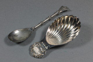 A silver spoon decorated Prince of Wales Feathers Sheffield 1923  together with a modern scalloped silver caddy spoon 1 ozs