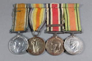 A group of 4 medals to 33813 Pte. Harry Atkins Cheshire Regt. comprising British War medal, Victory medal, George V issue  Special Constabulary Long Service medal with long service bar  1942 and a Defence medal