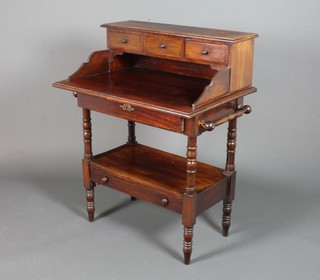 A 19th Century mahogany desk with raised 3 drawer back above 2 long drawers, raised on turned legs, adapted,40" x 31" x 21.5"