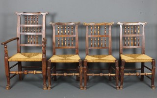 A set of 4 elm spindle back chairs with woven rush seats