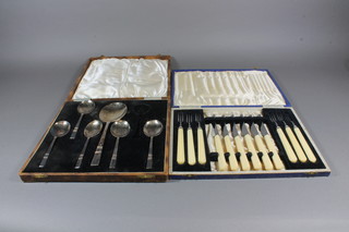 A set of 6 Art Deco silver plated fruit knives and forks together  with 5 silver plated fruit spoons and servers, cased