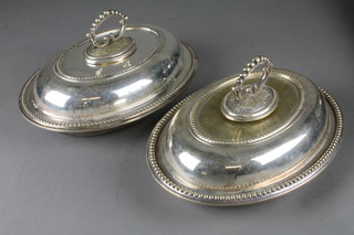2 oval silver plated entree dishes and covers
