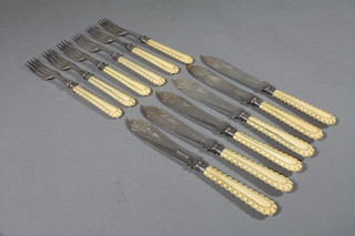 A set of 6 Victorian silver plated fish knives and forks with carved ivory handles by Mappin & Webb