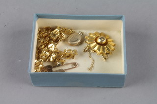 An 18ct gold necklet, a 9ct gold brooch, a 9ct gold cufflinks, bar brooch, locket 