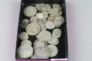 A collection of various silver coins 