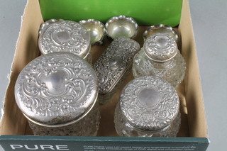 4 Victorian silver salts Birmingham 1888, raised on bun feet, 1 ozs together with 5 various cut glass dressing table jars with silver lids