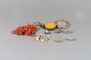 A 9ct hollow gold bracelet, 2 cameo brooches, a string of coral beads and a small collection of costume jewellery