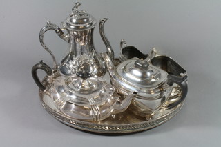 A Georgian style oval 3 piece silver plated tea service with teapot, sugar bowl and milk jug, an oval shaped teapot, a Britannia metal teapot and a chrome ditto
