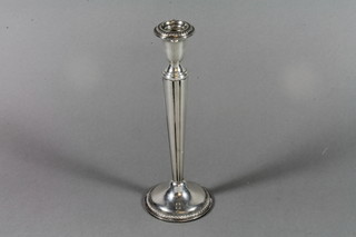 A Sterling silver candlestick 10" 