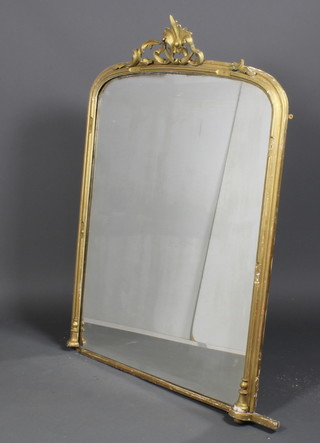 A Victorian gilt over mantel mirror with scroll crest 57"h x 41"w