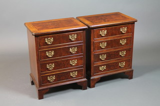A pair of Georgian style crossbanded and feather banded 4 drawer chests, raised on bracket feet 23.5"h x 17"w x 12"d  