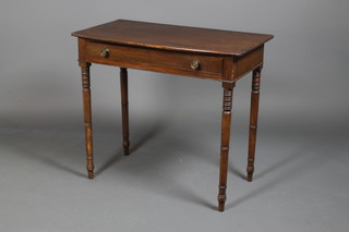 A 19th Century mahogany bow front side table on turned legs 31"h x 36"w x 20"d 