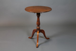 A 19th Century circular tripod table 20"