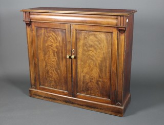 A Georgian mahogany 2 door cupboard on plinth base 42"h x 48"w x 15"d