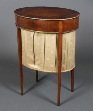 An oval oak work box with deep basket, hinged lid and gilt metal mounts, raised on square supports 27"h x 20"w x 13"d