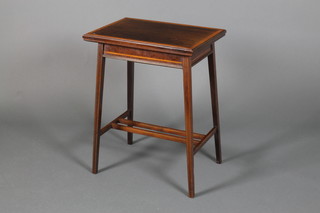 An Edwardian crossbanded mahogany swivel top card table on square legs 