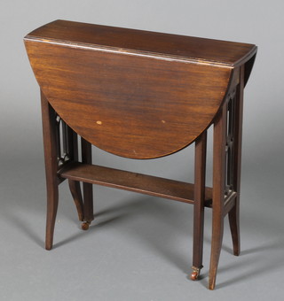 An Edwardian mahogany Sutherland table on pierced supports 24" x 24" x 31"