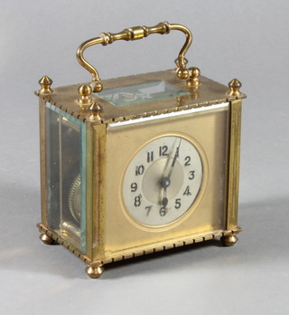 A brass cased carriage timepiece with silvered chapter ring 4"