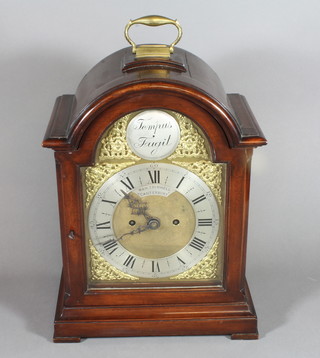 A Victorian and later mahogany bracket clock in the Georgian style, having a silvered chapter ring inscribed W & H Trimnell Canterbury, the domed case with brass carrying handle and on brass feet 18" x 11" x 6" ILLUSTRATED