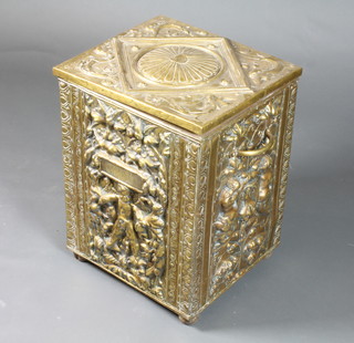 An embossed brass coal box with hinged lid 20"h x 16"w x 16"d