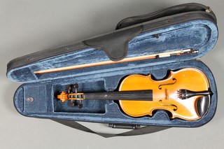 A childs Andreas Feller Romanian violin, cased and complete with bow