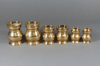 6 brass baluster shaped graduated measures