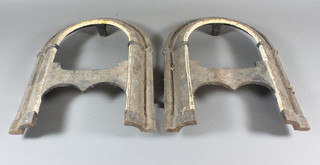A pair of Victorian cast iron arch shaped wall mounting boot  scrapers 12"