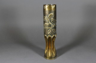 A WWI Continental trench art shell case decorated a bird
