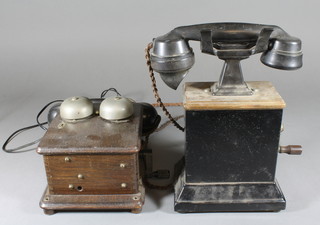 A Continental metal table telephone and a wall mounting telephone 