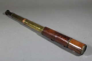 A leather bounded brass telescope