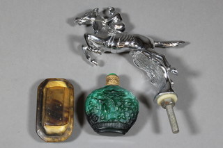 A Wesmo chrome car mascot in the form of a galloping race horse, a horn snuff box and a glass snuff bottle