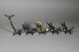 A stylised bronze figure of a giraffe 7" together with 4 other bronze figures of animals
