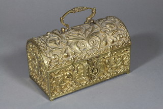An Spanish domed brass trinket box in the form of a trunk 7"