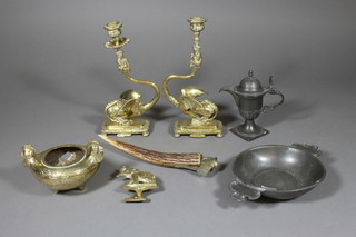 A pair of Victorian brass candlesticks in the form of griffins 9", a stag horn mounted cigar cutter, a pewter quaiche and a collection of metalware