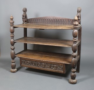 A Victorian carved oak 3 tier buffet with carved supports and 1 long drawer 48" x 52" x 23"