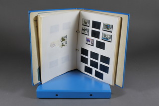 2 albums of GB stamps contained in a light blue ring binders