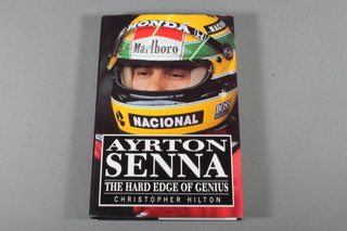1 volume Christopher Hilton "Ayrton Senna The Hard Edge of Genius" 1990, signed and dated Ayrton Senna 1991