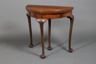 A Georgian style carved mahogany card table, raised on cabriole legs with scrolled knees, claw and ball feet 292 x 30" x 30"