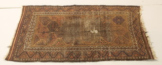 An Afghan rug with multi-row borders, heavily worn,