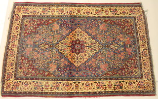 A Persian blue ground rug 40" x 54" 