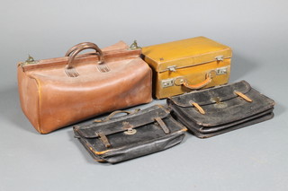 A Gladstone bag and 3 other items of luggage