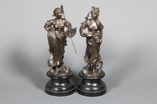 A pair of Victorian spelter figures of ladies on wooden bases 17 1/2", f, 