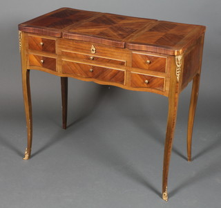 A 19th Century French Kingwood enclosed dressing table with crossbanded top revealing a fitted interior, having a brushing slide above 1 long drawer 29"h x 32"w x 18"d