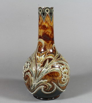 A Royal Doulton Lambeth baluster vase with cylindrical pierced neck, the brown body decorated with scrolling leaves and flowers by Rosina Brown 11"