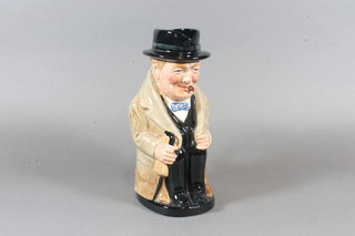 A Royal Doulton jug in the form of a seated Winston Churchill,  base marked 8360 9"